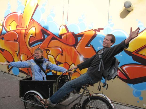 Lidiya and me playing on a Christiania bike at the Floating City, Copenhagen